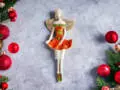 Anioł Theresa - pomarańcz -  30 x 14 cm figurka dekoracyjna gipsowa